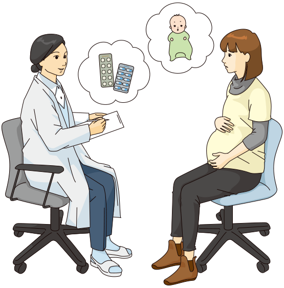 医師と相談する妊婦